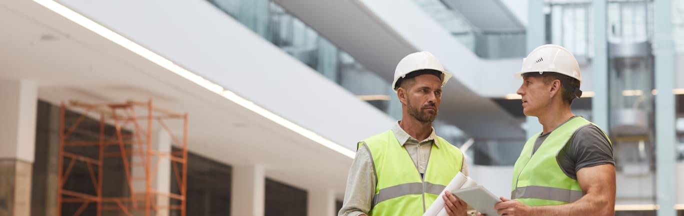 two men in hard hats